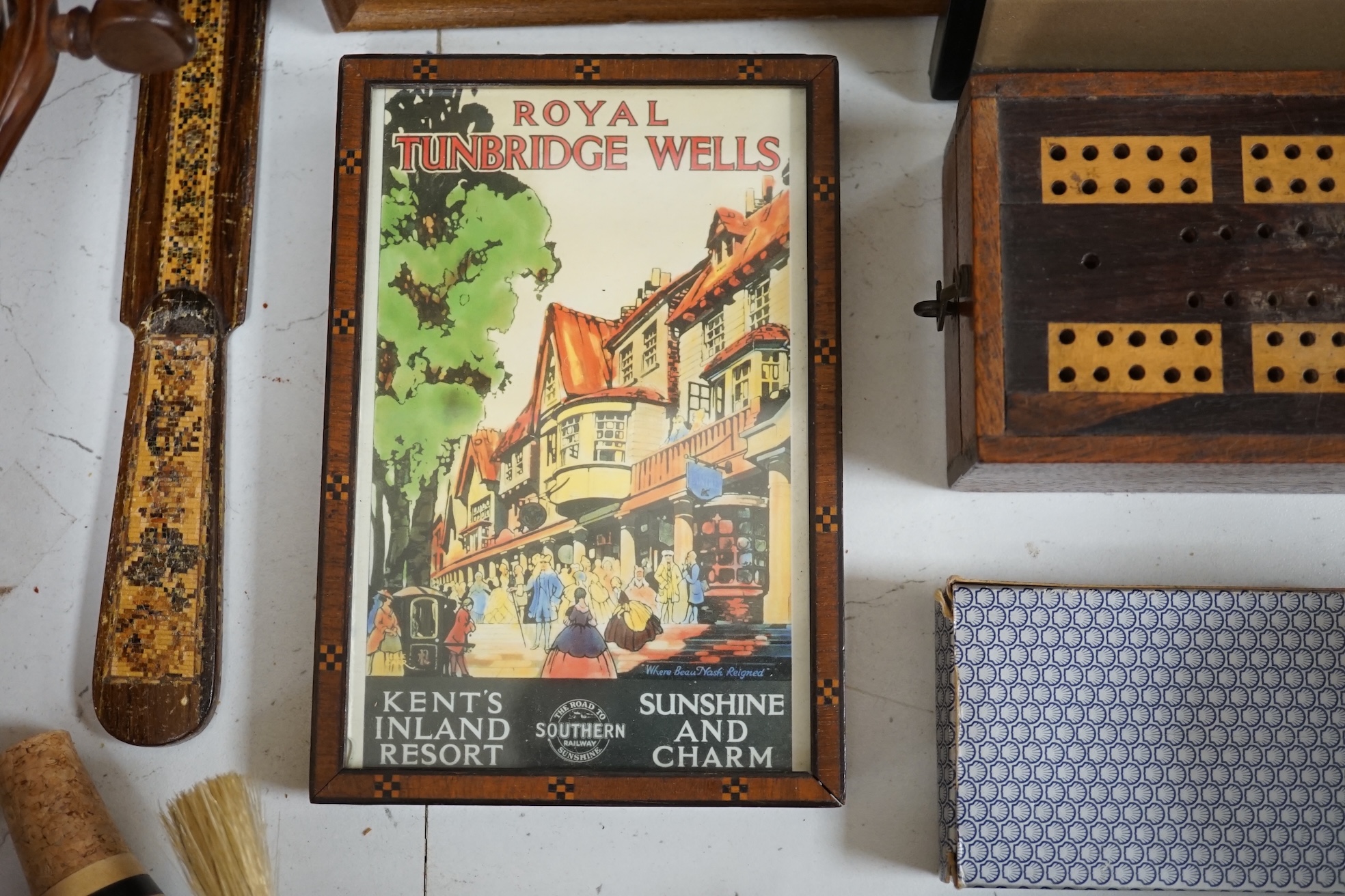 A collection of Tunbridgeware and related ephemera to include books, maps, cribbage board, desk stand and booklets. Condition - varies, mostly fair